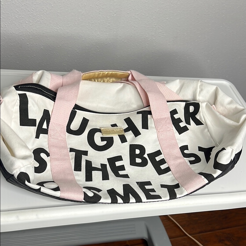 Benefit Pink and Black Travel Bag with Bold Design